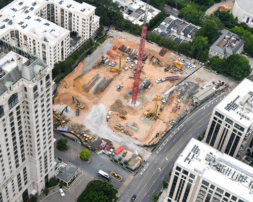 Active Elyse Buckhead development site surrounded by high-rise buildings and city streets.