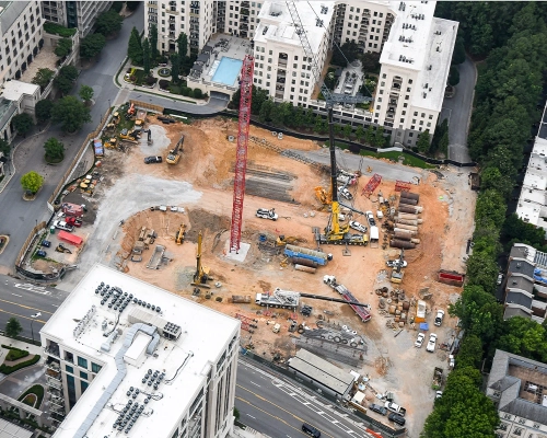 Aerial view of foundation work, cranes and construction materials at the Elyse Buckhead site near Peachtree Road.